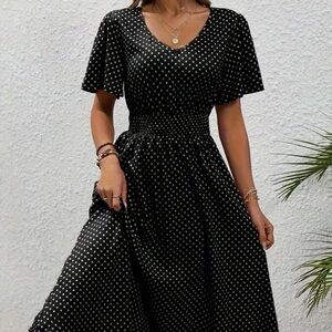 Elegant Black and White Polka Dot Dress